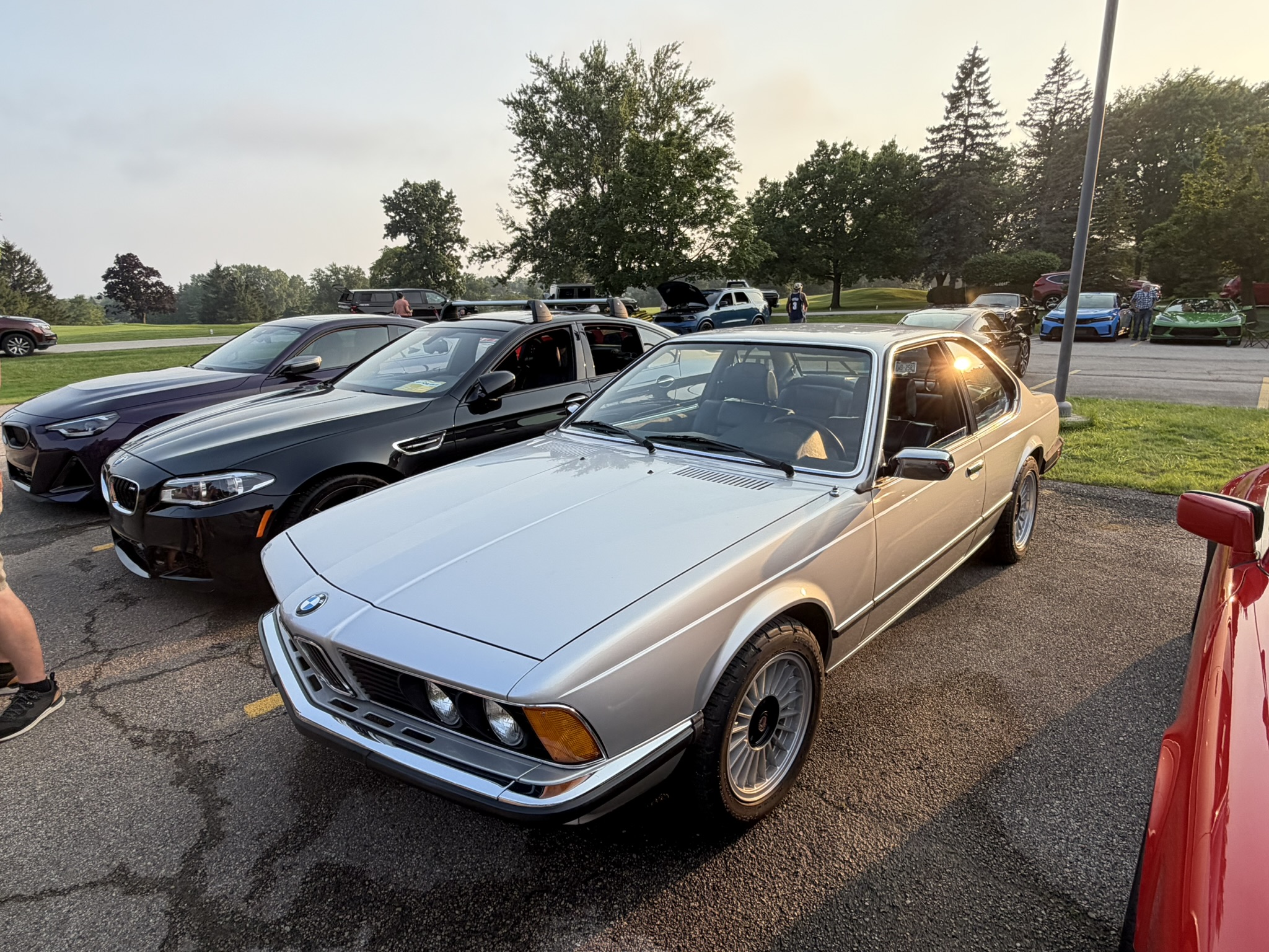 Silver BMW E24 coupe at Brew City Cruise Night during the evening