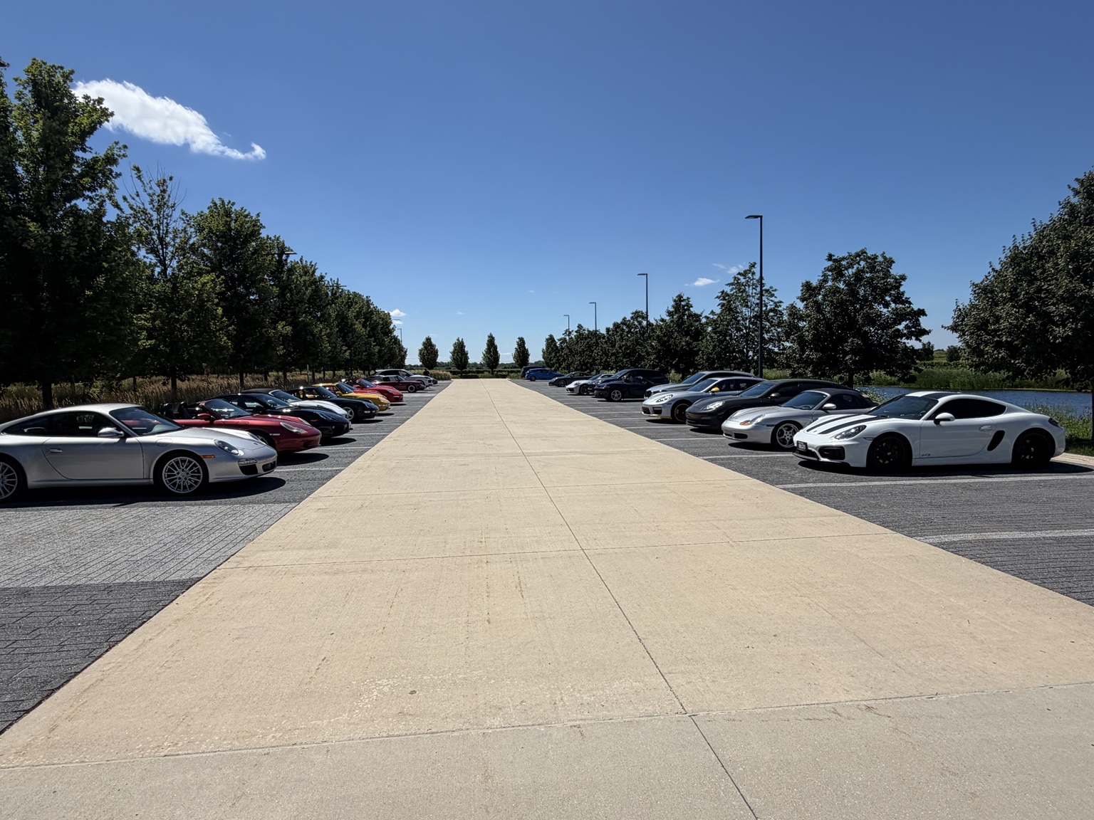 Porsche club cars lined up outside the Pritzker Military Museum and Library during a Wisconsin enthusiast outing