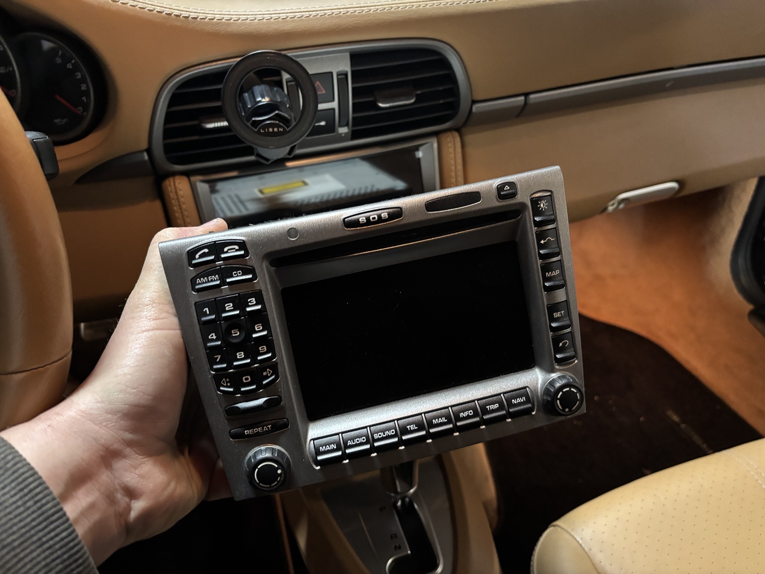 Factory Porsche PCM radio removed during a CarPlay retrofit